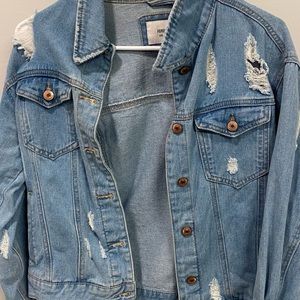 Distress medium wash jean jacket
